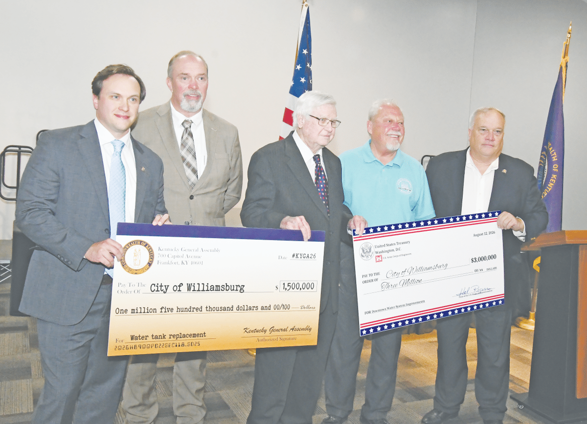 Local, state and national leaders deliver checks to Whitley County